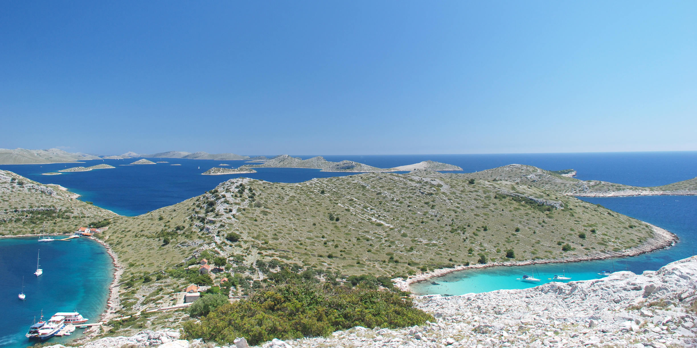 Clear turquoise water anchorage inside Kornati National Park — day 4 swimming focus on the Kornati Island Sailing route